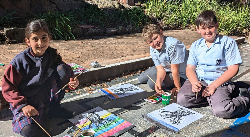 Students creating indigenous artwork at St Finbar's Primary School Glenbrook